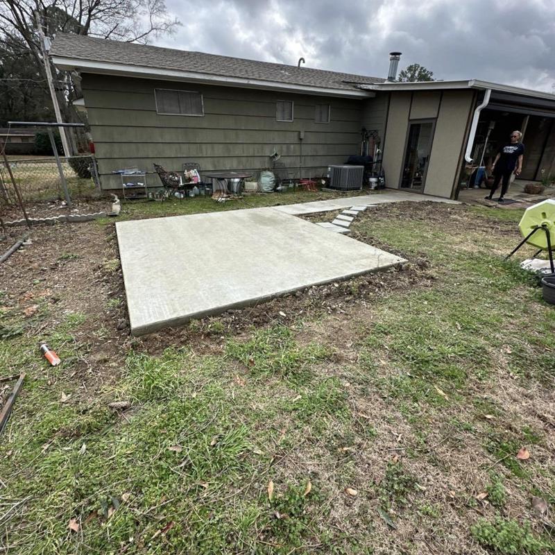 Concrete pad and walkway with reinforcement steel installation