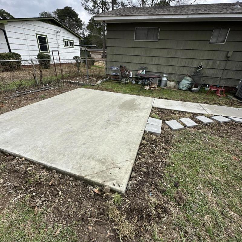 Concrete pad and walkway with broom finish and steel reinforcement