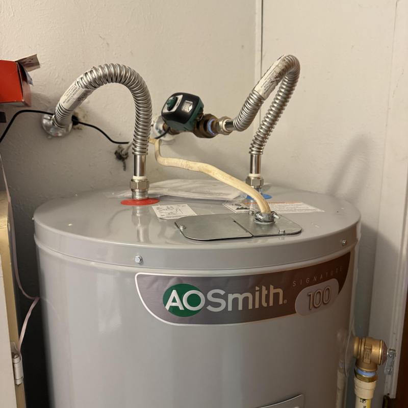 Electric water heater with new ball valve and flex lines