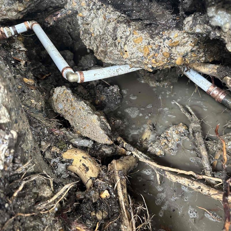 PVC underground pipe with leak and muddy water PVC underground pipe with leak and muddy water