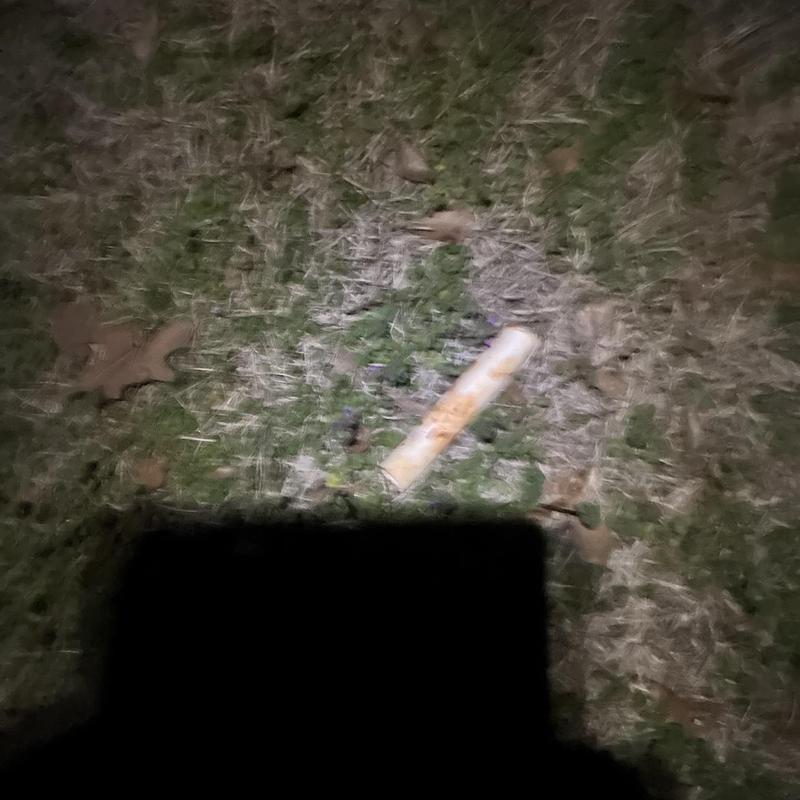 Three-quarter PVC pipe separation in yard near fence line