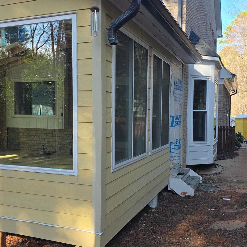 HardiePlank siding on new sunroom addition exterior