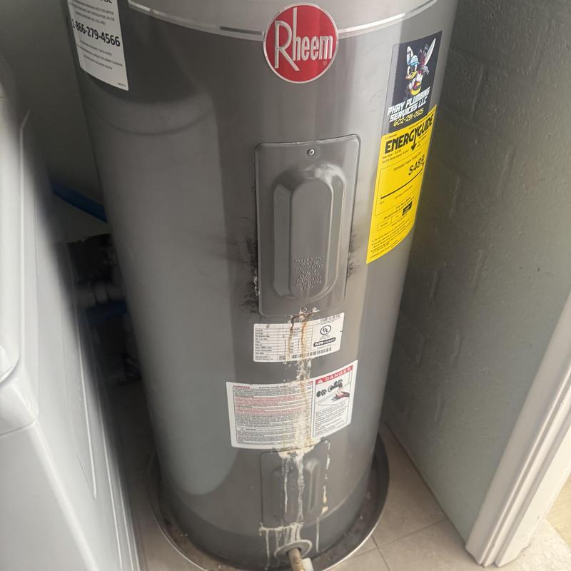 Rheem 50-gallon water heater with corrosion stains
