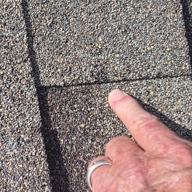 Asphalt roof shingle granule loss from hail damage