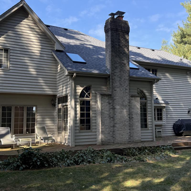 Atlas Pinnacle Pristine asphalt roof with skylights and gutters