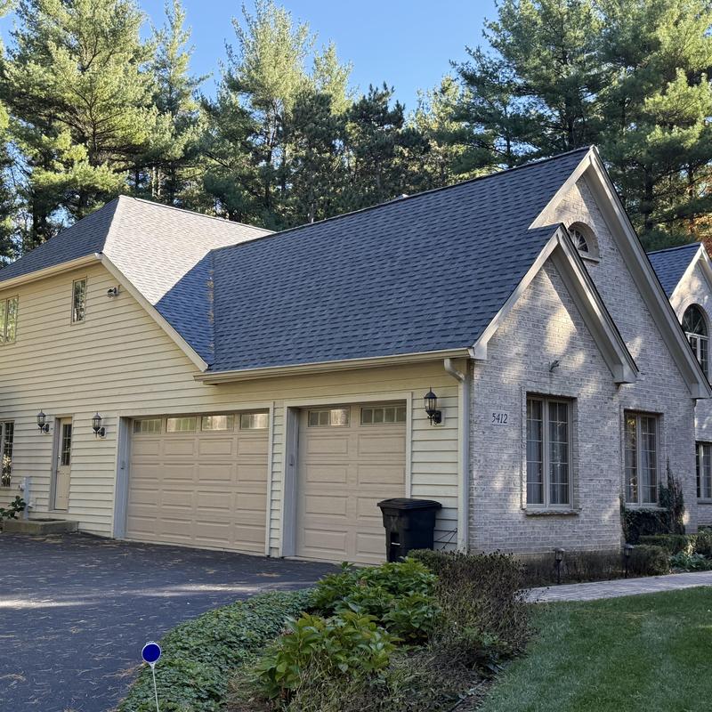 Atlas Pinnacle Pristine asphalt roof and gutters