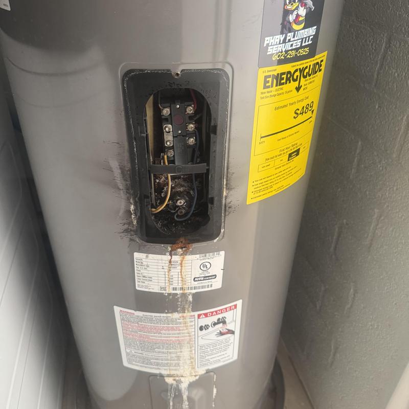 Water heater electrical panel with burn damage