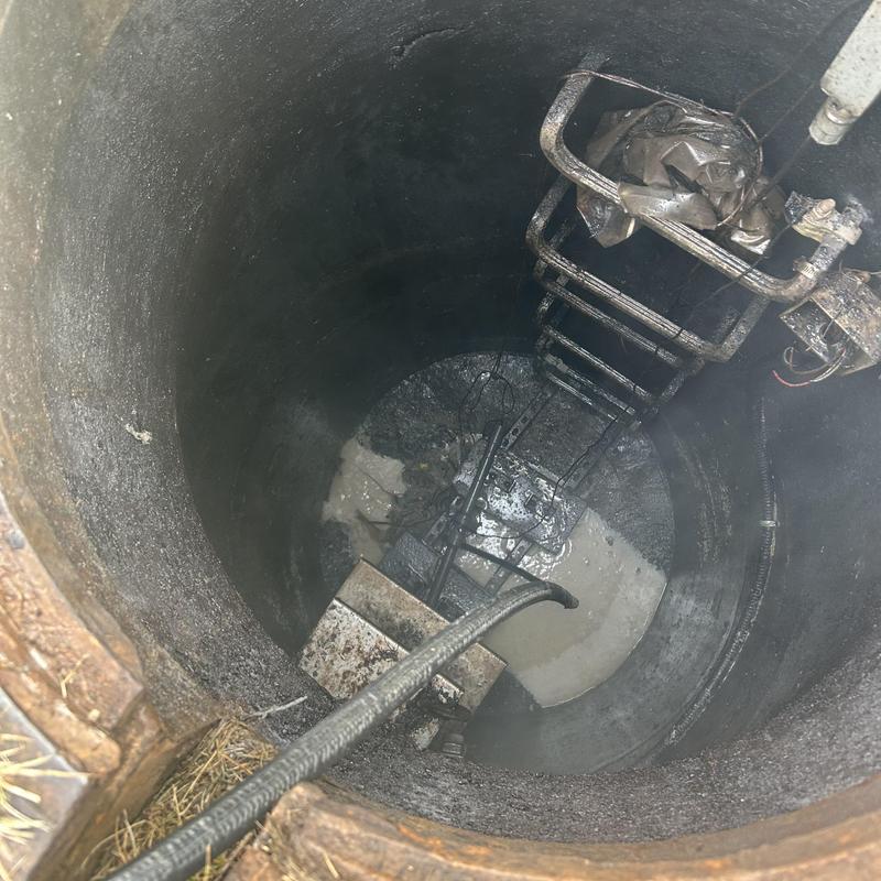 Sanitary line jetting and snaking inside manhole