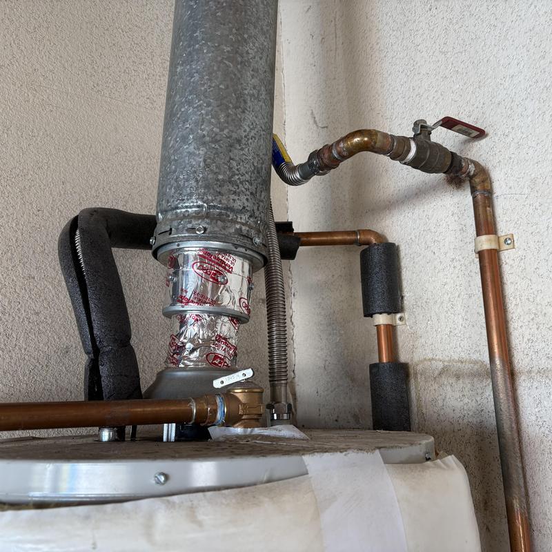 Water heater flex lines with copper pipes and insulation