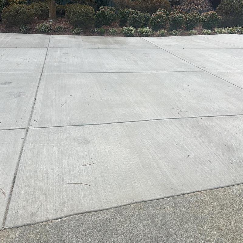 Concrete driveway with fresh joints and clean surface