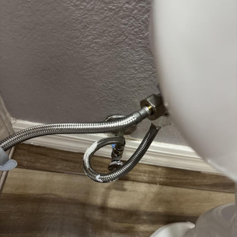 Toilet water supply line with calcium buildup in Goodyear, AZ