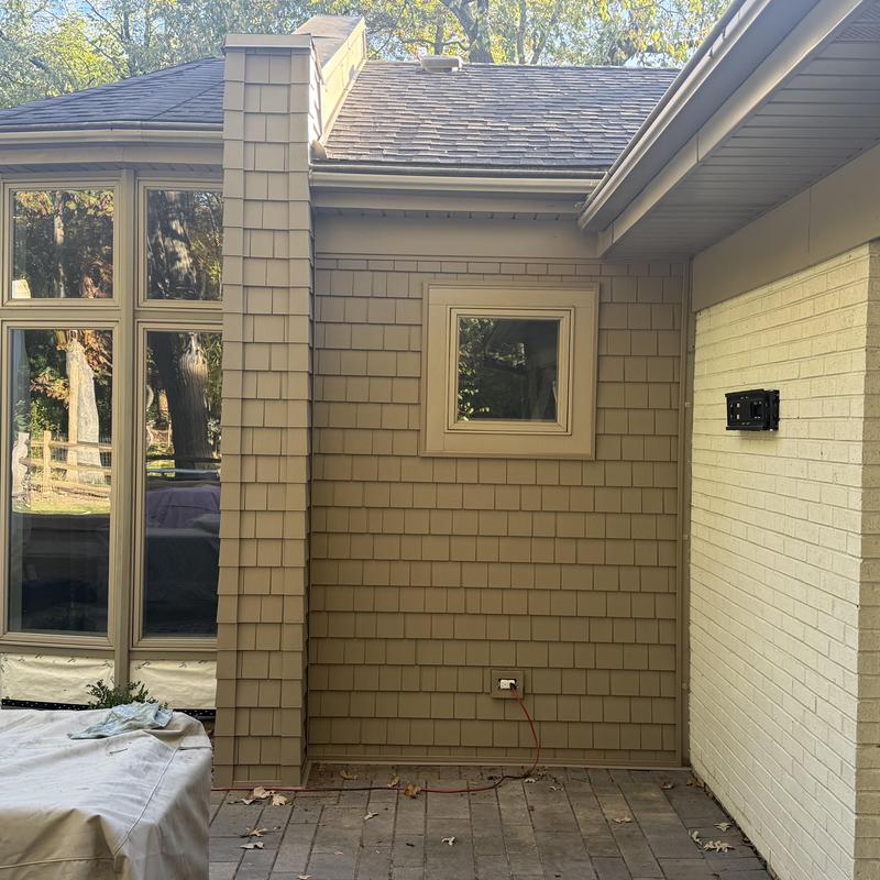 Vinyl shake siding and small window exterior wall