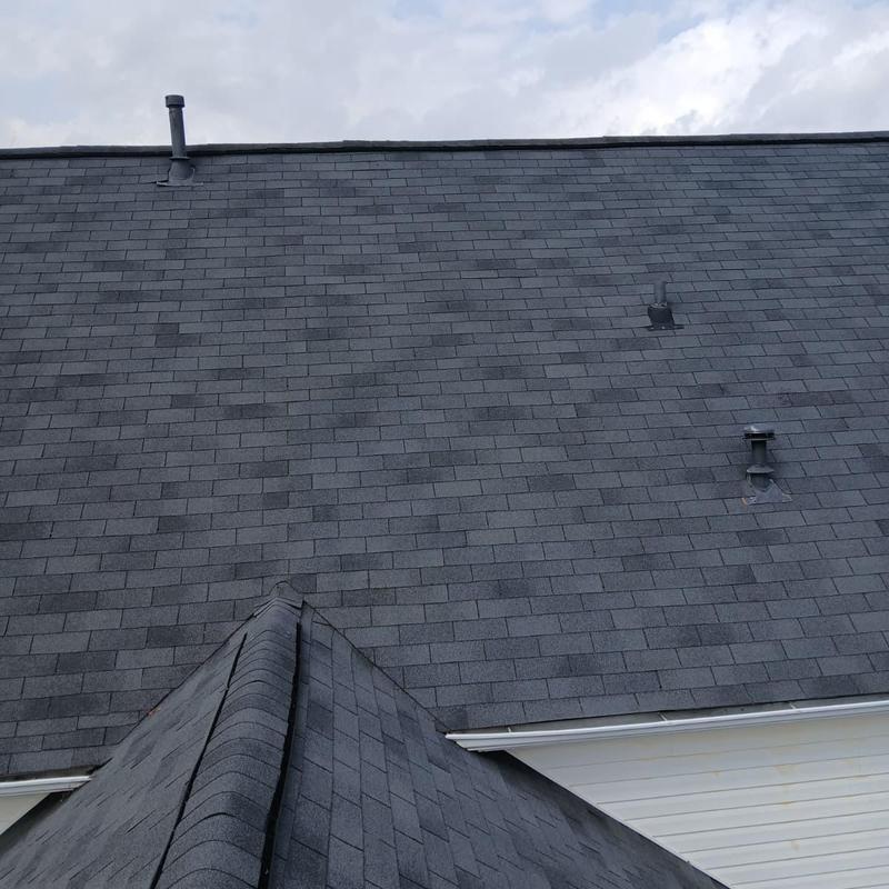 Asphalt shingles on residential roof in Loganville, GA