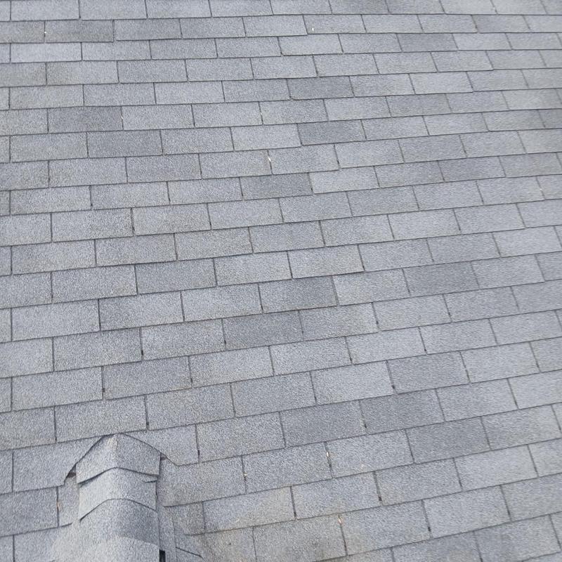 Roof shingles replacement on residential roof