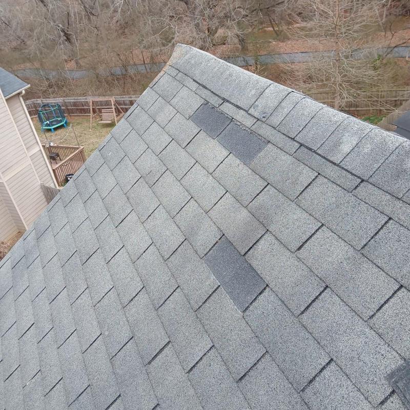 Field shingles and ridge caps on roof