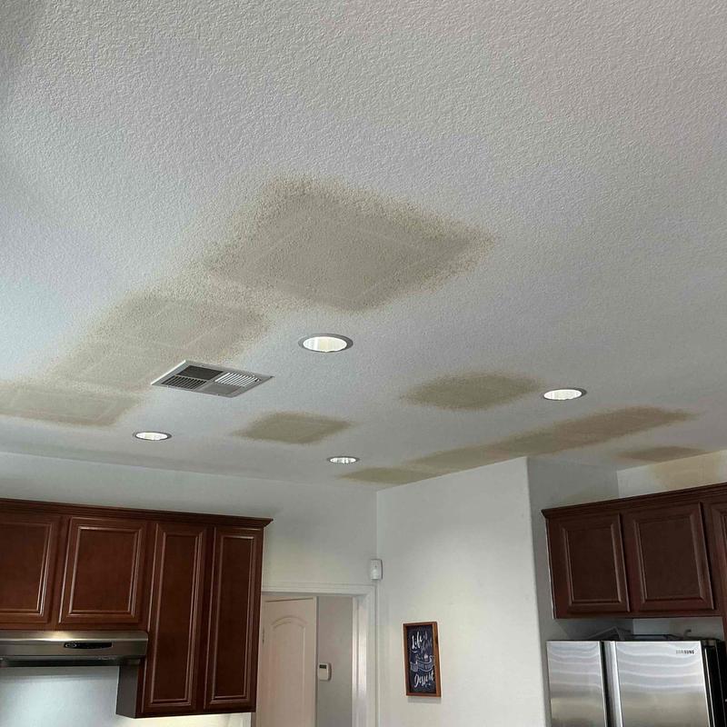 Ceiling drywall patches around recessed lights and vent