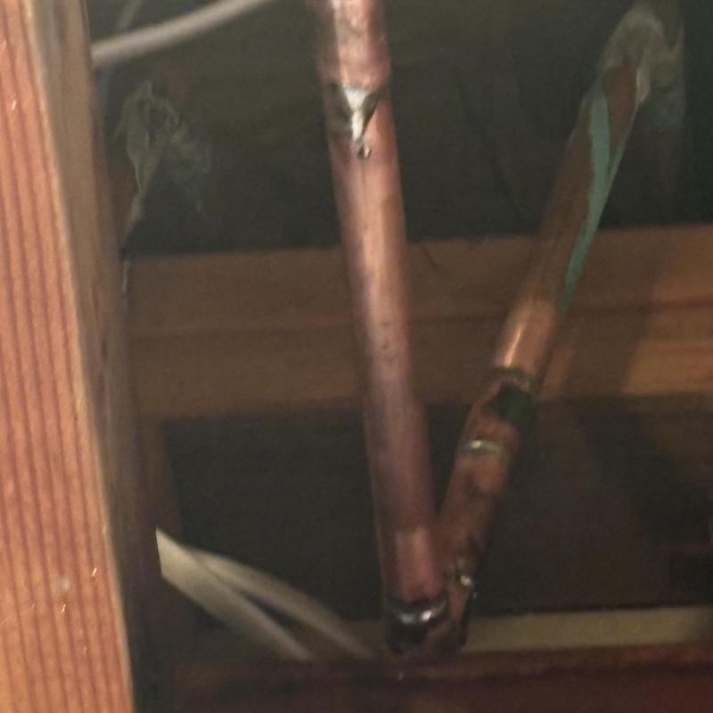 3/4-inch copper pipe leak at 90-degree elbow in ceiling
