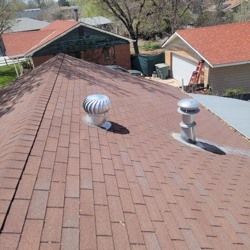 Roof pipe jacks and storm collars sealed on shingle roof Roof pipe jacks and storm collars sealed on shingle roof