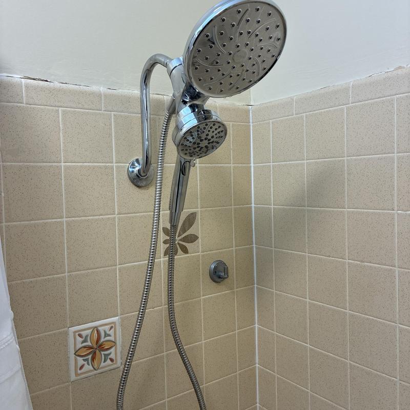 Shower head and handheld fixture installation in tiled shower