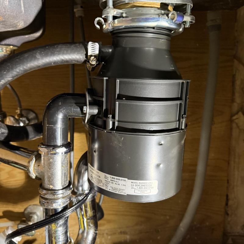Garbage disposal with new P-trap and waste kit installation