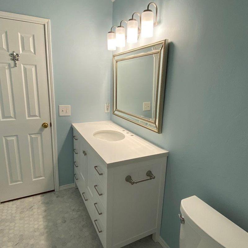 Bathroom vanity with sink and modern lighting Bathroom vanity with sink and modern lighting