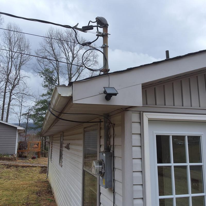 Electric meter and wiring on house exterior