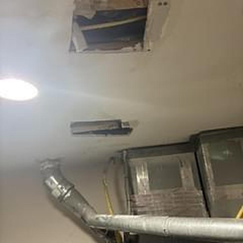 Bathtub spout leak access opening in ceiling