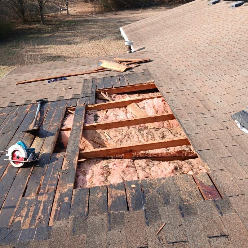 Back porch roof decking removed for shingle replacement