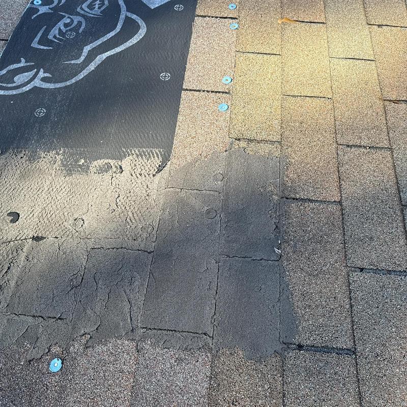 3-tab shingles with damaged decking and underlayment