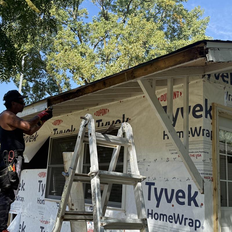 Soffit and fascia installation with house wrap