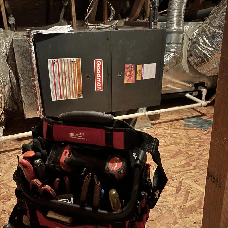 Goodman 5 ton horizontal furnace with tools in attic