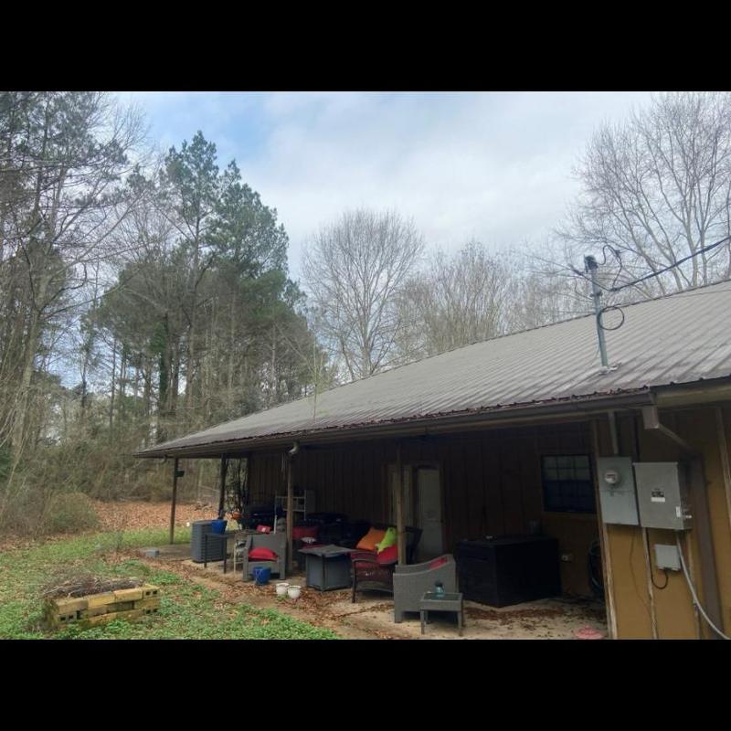 Metal roof system inspection on residential porch