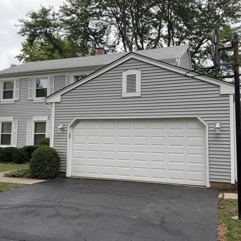 Vinyl siding and soffit on residential garage exterior