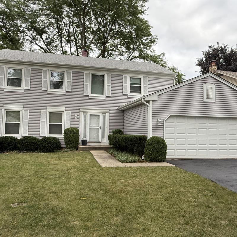 Mastic Quest vinyl siding and trim on two-story house