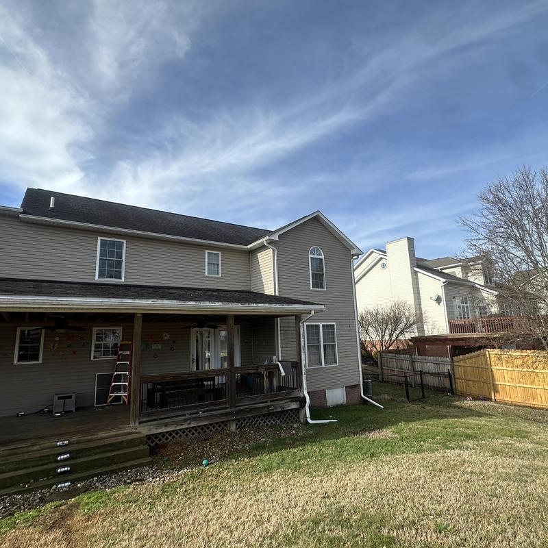 Asphalt shingles roofing on residential house exterior