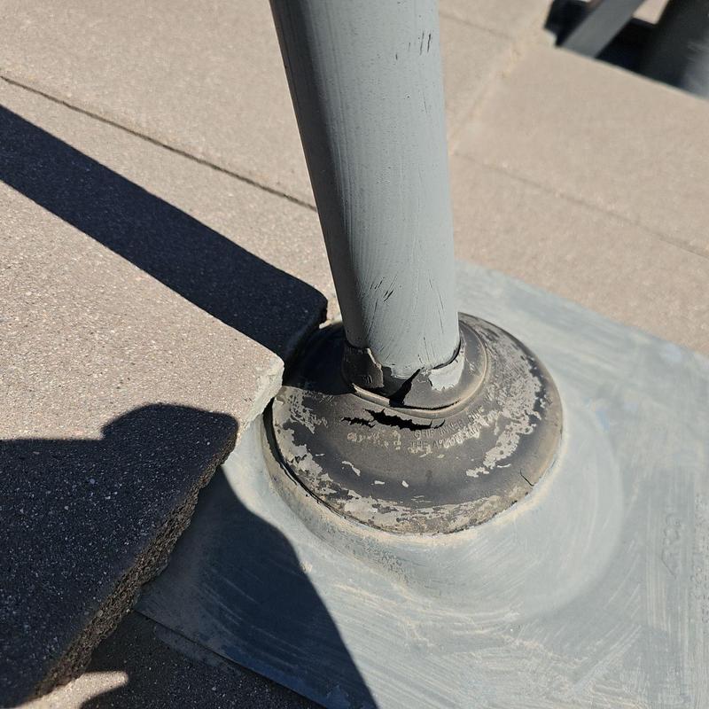 Pipe jack rubber boot with cracks on tile roof Pipe jack rubber boot with cracks on tile roof