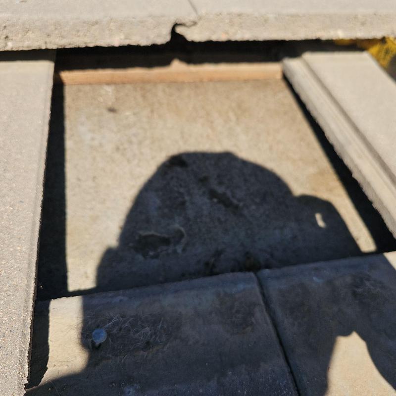 Broken tile on concrete tile roof section Broken tile on concrete tile roof section