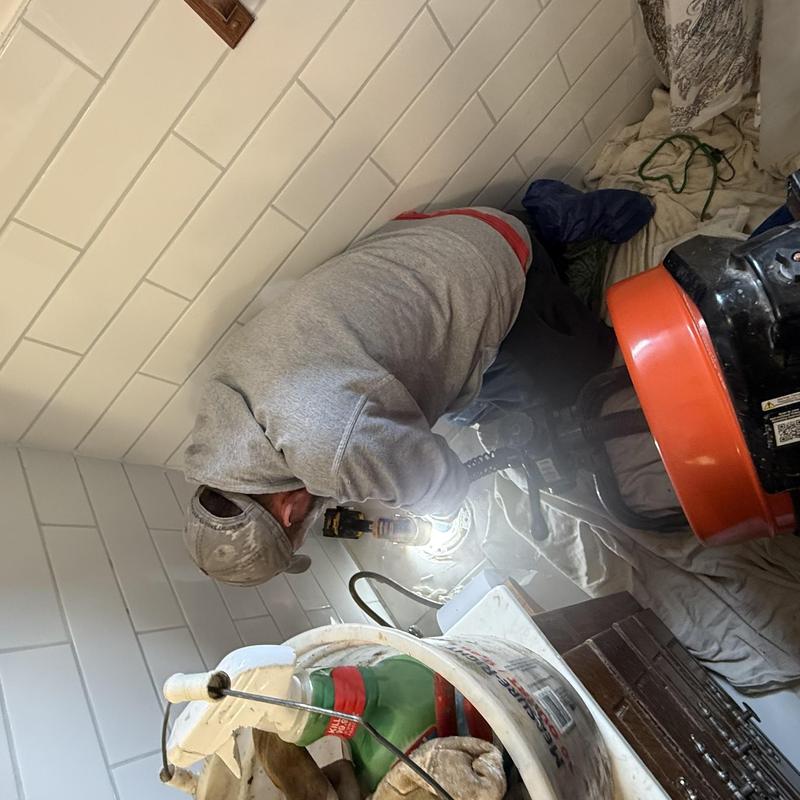 Toilet flange cleaning and resealing in bathroom
