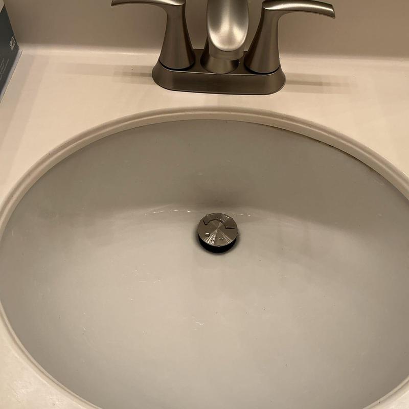 4-inch bathroom faucet with sink drain assembly