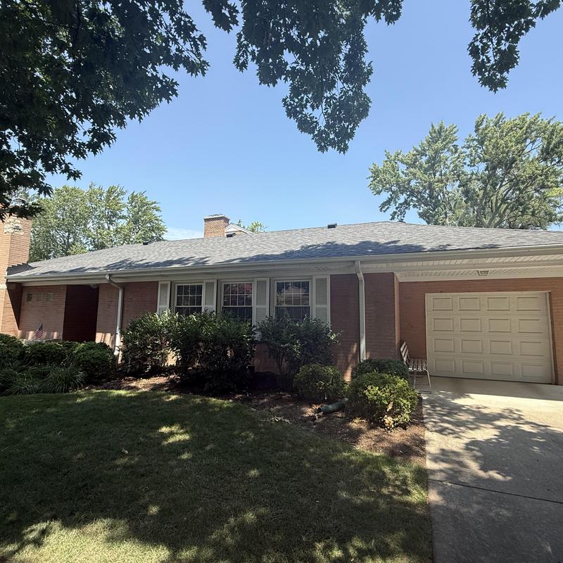 Atlas impact class 4 roof on suburban brick house