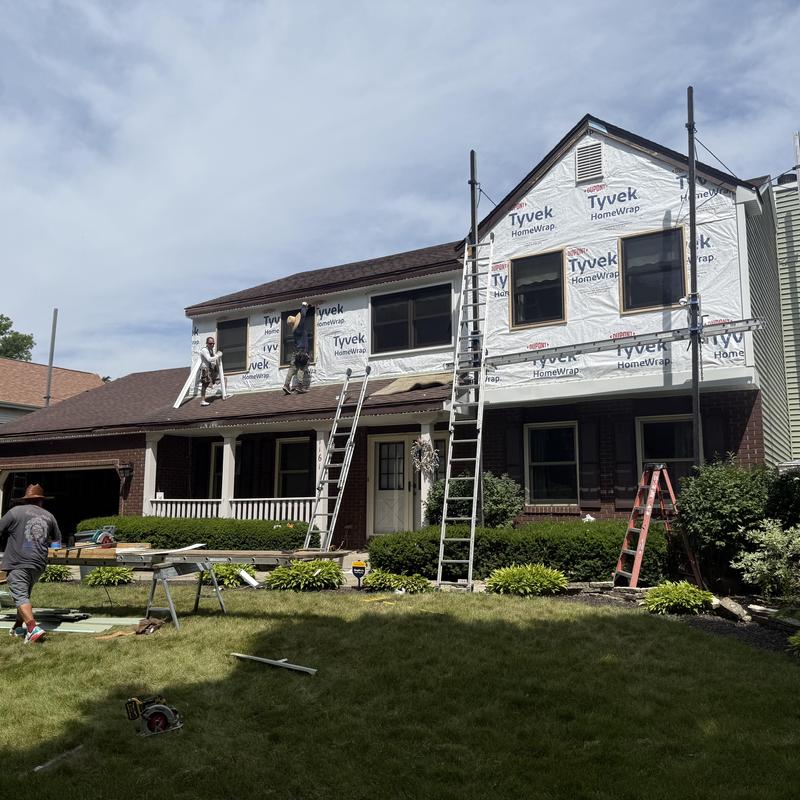 Alside Charter Oak vinyl siding installation on house