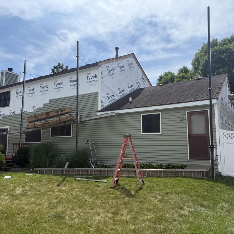 Alside Charter Oak vinyl siding installation outdoors