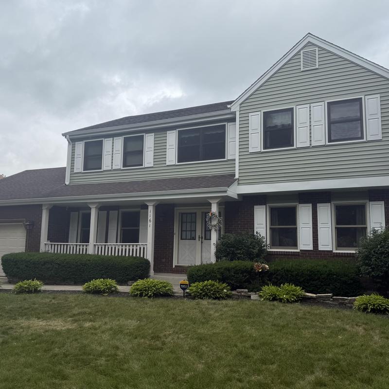 Alside Charter Oak vinyl siding on two-story home