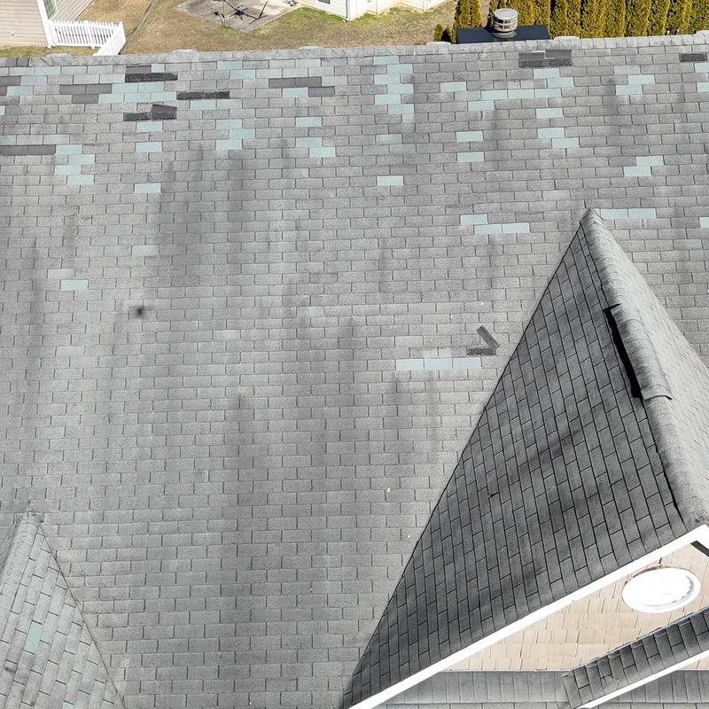 Roof shingles with multiple missing patch repairs