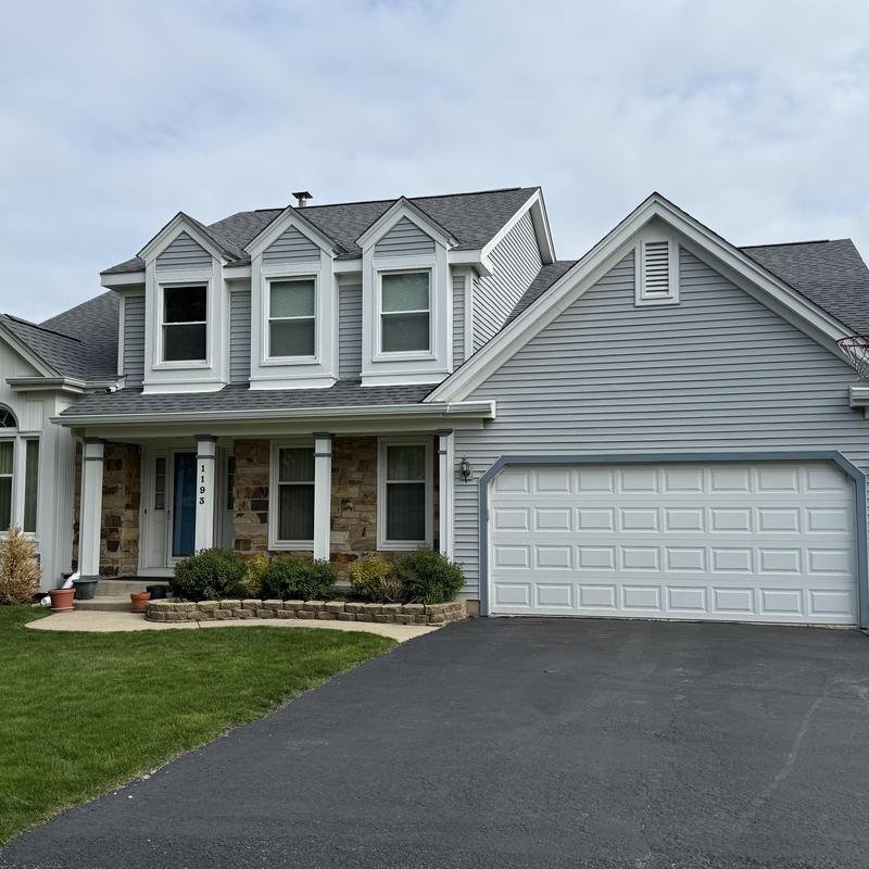 Atlas Class 4 impact roof with gutters on suburban house