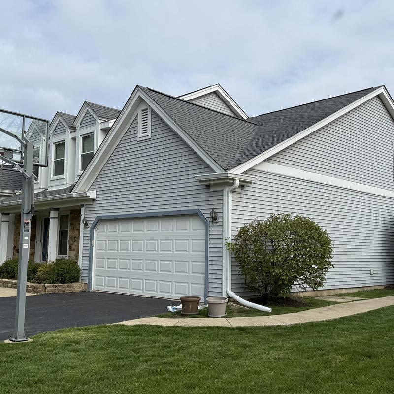 Class 4 impact roof and gutters on house exterior