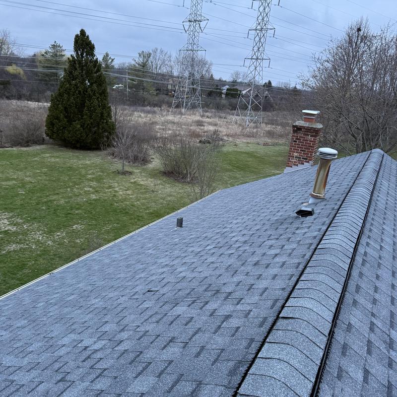 Atlas Impact Class 4 shingle roof with chimney vents