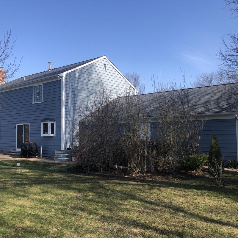 Atlas impact class 4 roof on blue house in Long Grove