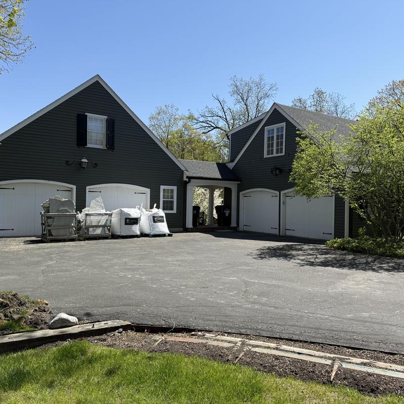 Gutter guards installation supplies outside Inverness home