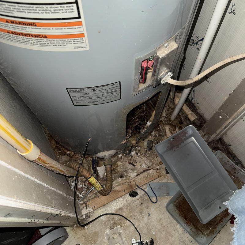 AO Smith ProLine water heater with electrical panel open